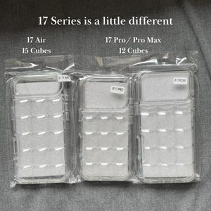 May include: Clear plastic phone cases in sealed packaging. The text on the packaging reads "17 Series is a little different", with labels for "17 Air" and "17 Pro/Pro Max". The cases are designed to hold 15 and 12 cubes, respectively.