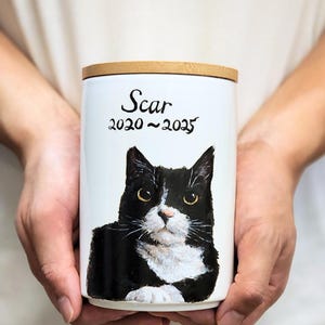 Hand-painted ceramic pet memorial urn, custom realistic portrait