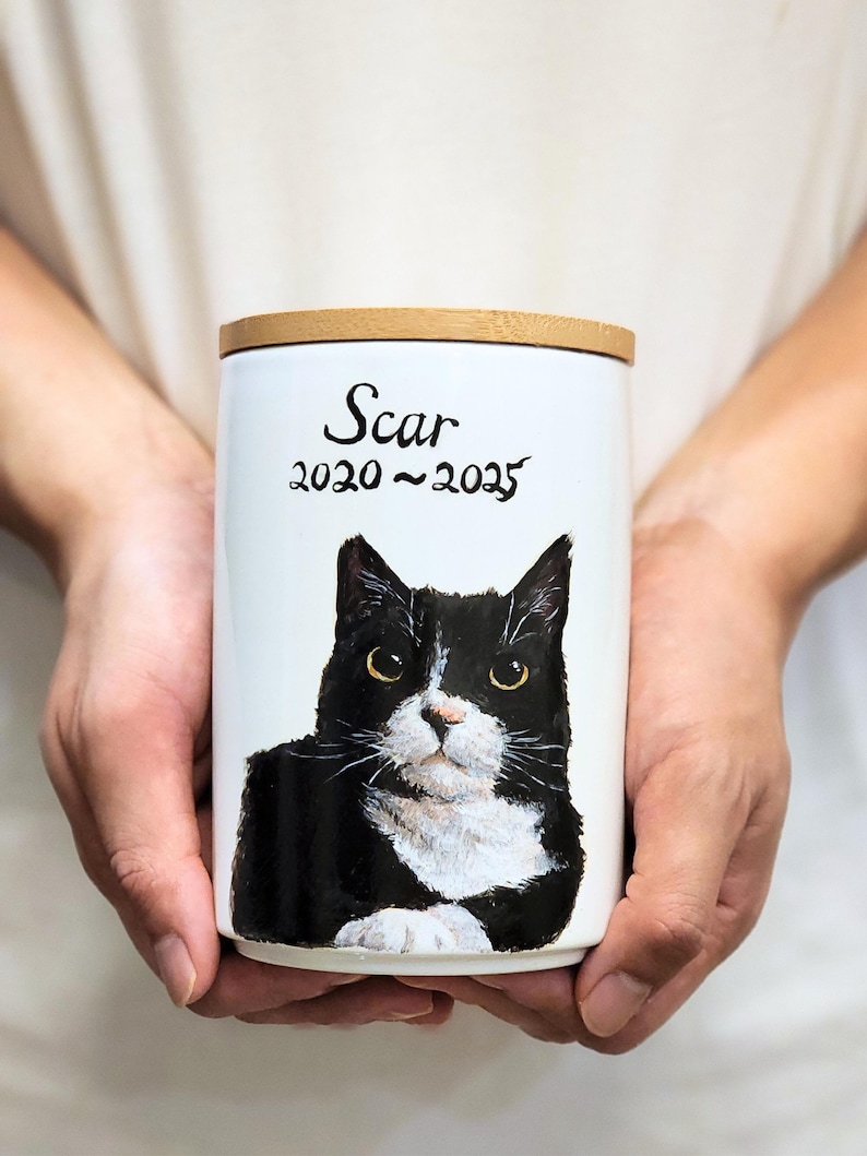 Hand-painted ceramic pet memorial urn, custom realistic portrait