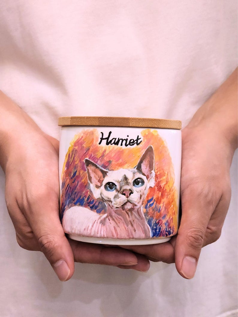 Hand-painted ceramic pet memorial urn, custom realistic portrait