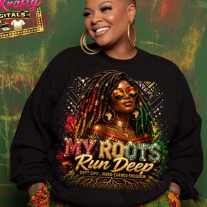 May include: Black sweatshirt with a graphic of a woman with dreadlocks, wearing sunglasses with the colors of the Pan-African flag. The text "MY ROOTS RUN DEEP" is below the image. The woman is wearing gold hoop earrings and a patterned skirt.