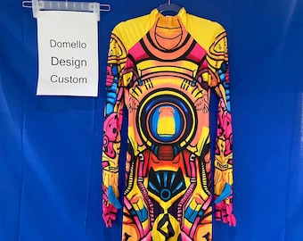 May include: A yellow, pink, blue, and black long-sleeved bodysuit with a graphic print of a robot. The text "Domello Design Custom" is visible on a white sign in the background.