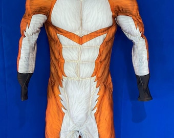 May include: Orange and white full-body suit with a fox design. The suit has a zipper in the front and black accents on the wrists and ankles.