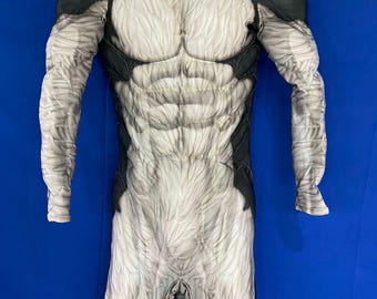 May include: A full-body costume with a white and gray fur pattern, black accents, and a tail. The costume is designed to resemble a werewolf.