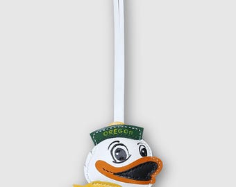 Leren tashanger met Oregon Duck-mascotte, accessoire voor wedstrijddagen op de universiteit, cadeau met schoolspirit, tashanger voor Duck-fans, afstudeercadeau