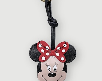 Handmade leather mouse keychain with a red bow