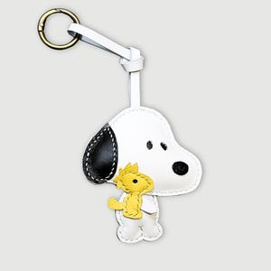 Adorabile portachiavi/ciondolo in pelle a forma di cane – Accessorio per borsa/portachiavi fatto a mano