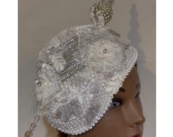 White and silver lace Fascinator