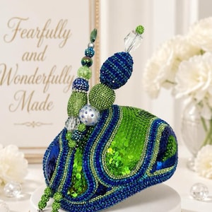 Blue and Green sequence Fascinator .