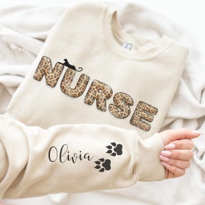 Personalized leopard nurse sweatshirt with sleeve print personalized nursing sweater gift for new nurse,leopard nurse sweater birthday gift