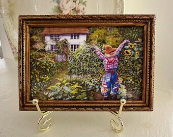 Grandpa's House Framed Print - Autumn Farmhouse Wall Art with Scarecrow and Sunflower Garden Scene