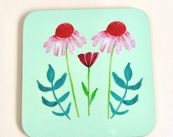 Pink echinacea flower and leaves Coaster on a green background - Designed and printed in the UK
