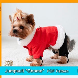 May include: A small dog wearing a red jumpsuit with white faux fur trim and black pants. The jumpsuit is labeled "XS" and the text "Jumpsuit 'Gnome' PDF Pattern" is visible.