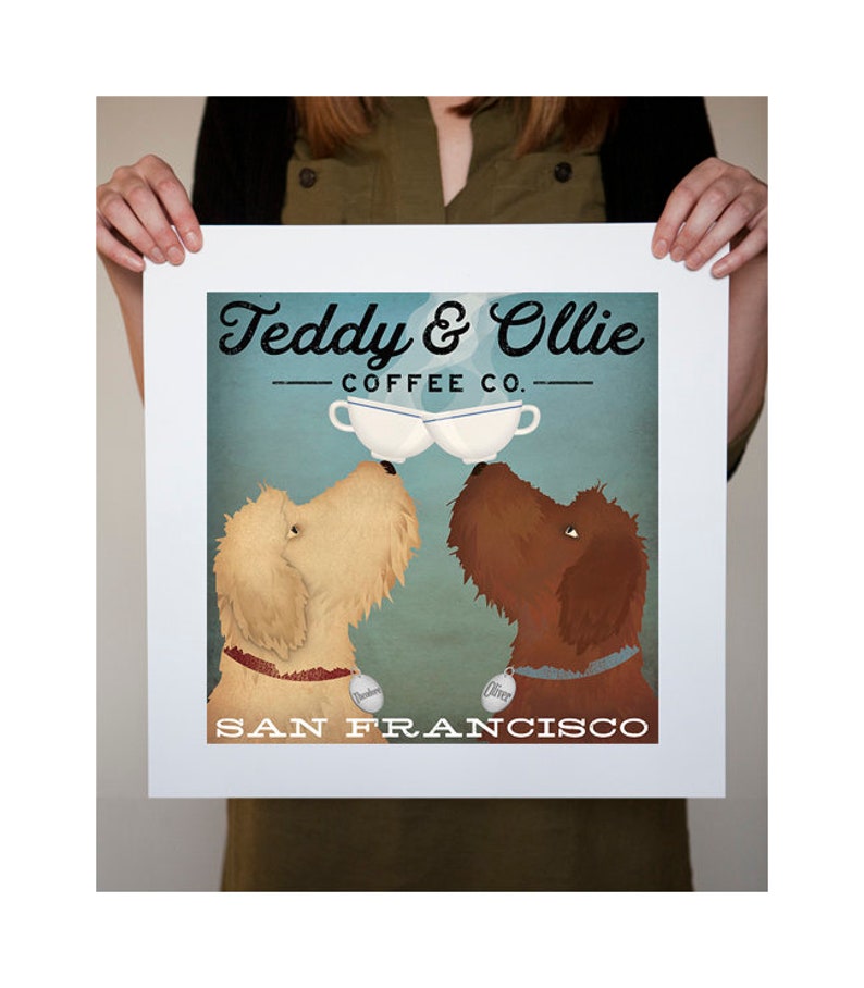 May include: A vintage-style illustration of two dogs, Teddy and Ollie, with coffee cups in their mouths. The text reads "Teddy & Ollie Coffee Co." and "San Francisco".