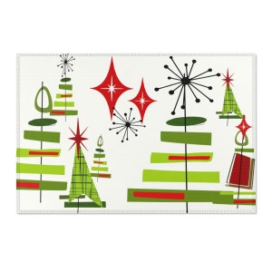 May include: A white background with a mid-century modern design featuring green and red Christmas trees with star ornaments. The trees are stylized with geometric shapes and lines.