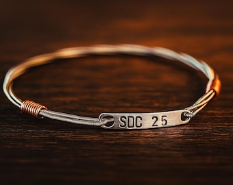 Pulseira personalizada de corda de guitarra