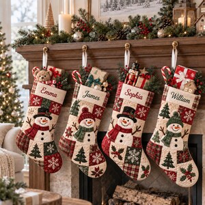May include: Four quilted Christmas stockings hanging from a wooden mantel, each featuring a snowman applique, festive patterns, and a personalized name tag reading Emma, James, Sophia, or William, filled with small gifts and holiday greenery.