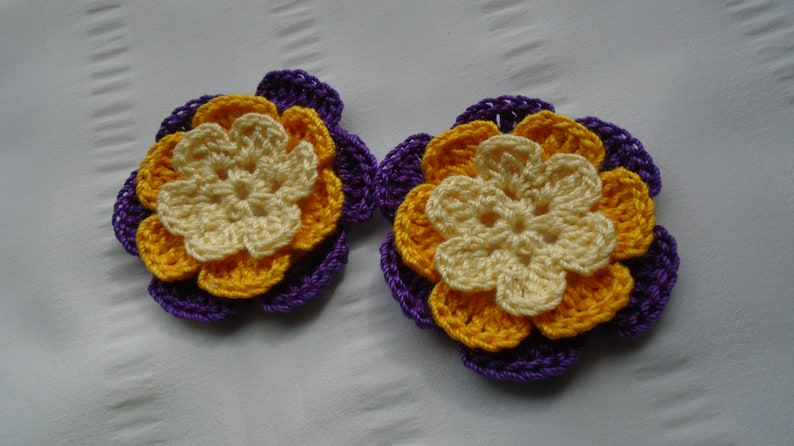 Crocheted flowers set of 2 appliques 2.5 inch embellishment motif