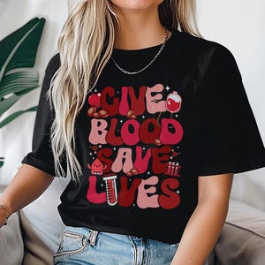 Give Blood Save Lives T-Shirt, Bold Blood Donation Graphic Tee, Red & Pink Design, Awareness Apparel for National Blood Donor Month