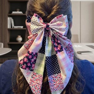 Large vintage handmade hair bow with raw edges