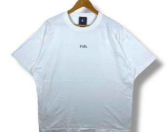 ¡Rara! Camiseta vintage de anime con el logo del FLCL Fooly Cooly Embroidery Center, talla extragrande.