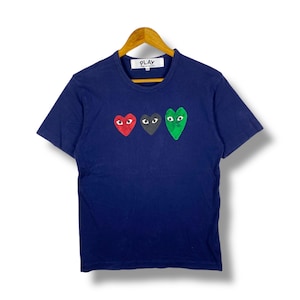 ¡Excepcional! Camiseta con el logotipo gráfico desteñido de Comme Des Garçons, talla mediana