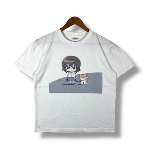 May include: White t-shirt with a cartoon illustration of a girl with brown hair walking a dog. The girl is wearing a blue skirt and a white shirt. The dog is brown and white.