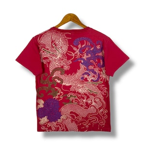 May include: Red t-shirt with a detailed dragon design in gold and purple. The short-sleeved shirt features a crew neck and a vibrant graphic. The dragon design covers the back of the shirt.