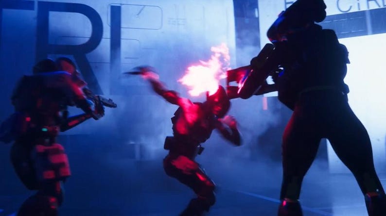 Puede incluir: Una escena de acci&oacute;n dram&aacute;tica con tres figuras con armaduras futuristas, iluminadas por luces rojas y azules. Una figura est&aacute; envuelta en llamas, mientras que otras sostienen armas, lo que sugiere un tema de ciencia ficci&oacute;n o acci&oacute;n.