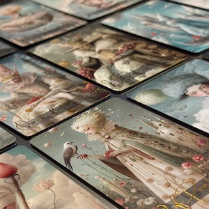 May include: A collection of tarot cards with fantasy illustrations. The cards feature images of figures, birds, and floral elements in a soft, pastel color palette. The cards are arranged on a dark surface.