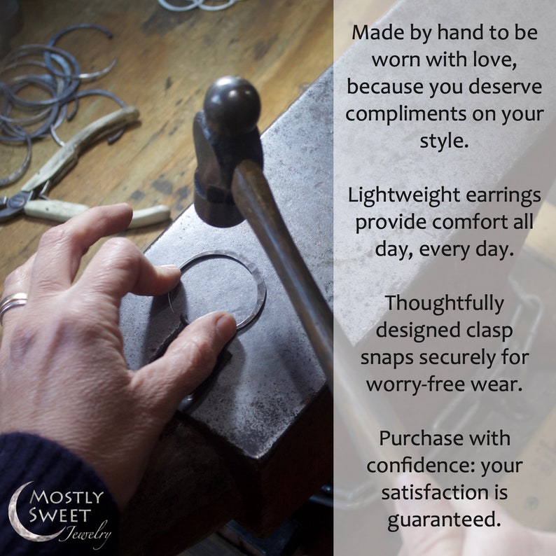 Behind-the-scenes jewelry making photo showing artisan's hand hammering metal on a bench block. Workshop tools visible include hammer and pliers. Split-screen format with promotional text highlighting key benefits: "Made by hand to be worn with love," "Lightweight earrings provide comfort all day," "Thoughtfully designed clasp snaps securely," and "Purchase with confidence: satisfaction guaranteed." Includes Mostly Sweet Jewelry logo.