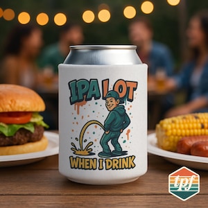 May include: White can cooler featuring the text "IPA LOT WHEN I DRINK" and a cartoon illustration of a person urinating. The cooler is on a wooden table with food and people in the background.