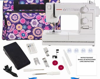 May include: A white Janome HD-1000 sewing machine with accessories, including a foot pedal, bobbins, and various presser feet. A tote bag with a floral pattern and the text "EXCLUSIVE BONUS BUNDLE" are also included.