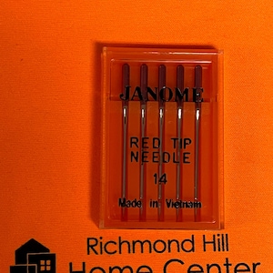 May include: A clear plastic package of six red tip sewing machine needles, size 14, made in Vietnam. The package is labeled "JANOME RED TIP NEEDLE 14 Made in Vietnam".