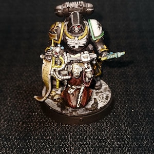 Painted tabletop minature wargame model. Warrior Priest