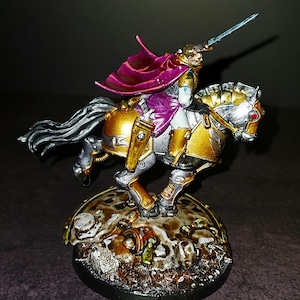 Painted tabletop minature wargame model. War Horse and Rider: red