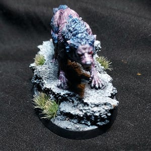 Painted tabletop minature wargame model. Dire Wolf