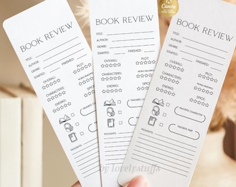 Puede incluir: Tres marcadores blancos con el texto "BOOK REVIEW" en la parte superior. Cada marcador tiene secciones para el título, el autor, el género y las estrellas de calificación. Los marcadores se sostienen en una mano.