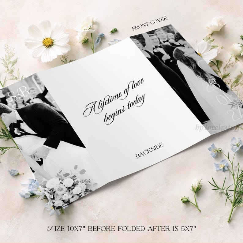 May include: A white wedding invitation with the text "A lifetime of love begins today" in elegant script. The front and back covers feature black and white photos of a wedding. The invitation measures 10x7 inches before folding, 5x7 inches after.