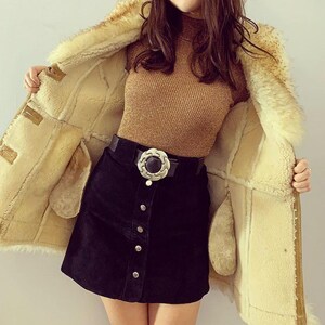 boho Penny Lane coat, women's warm shearling overcoat, Afghan vintage suede coat, timeless brown fur coat, stylish mid-length winter wear, 90s retro fashion coat, handmade boho shearling coat, fur-lined Afghan leather coat, cozy women's trench coat, soft suede mid-length overcoat, elegant bohemian fur coat, warm and luxurious winter coat, fashionable suede leather overcoat, stylish retro-inspired shearling coat, winter wardrobe essential for women, unique handmade coat