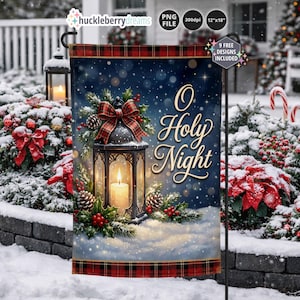 May include: A rectangular garden flag featuring a dark blue background with bokeh lights and the text O Holy Night. A black lantern with a lit candle sits in the center, surrounded by pine branches, pinecones, red berries, and a plaid bow.
