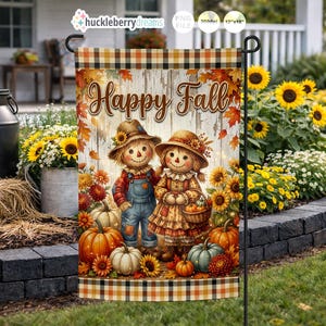 May include: A rectangular garden flag featuring a rustic white wood background with the text Happy Fall in brown script. Two scarecrows stand in the center surrounded by orange, white, and green pumpkins, sunflowers, and autumn leaves.