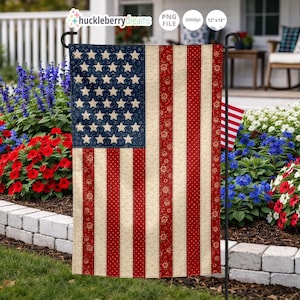 May include: A garden flag featuring the American flag design. The flag has a blue field with white stars and red and white stripes. The flag is displayed on a black metal stand in a garden setting, surrounded by colorful flowers.