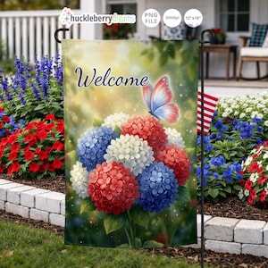 May include: A garden flag with the word "Welcome" in script, featuring a bouquet of red, white, and blue hydrangeas and a butterfly. The flag is 12" x 18" and is designed for outdoor use. The flag is displayed in a garden setting with colorful flowers.