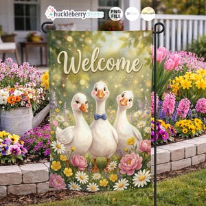 May include: A garden flag featuring three cartoon geese in a field of flowers with the word "Welcome" in script. The geese are white with orange beaks and one wears a blue bow tie. The background is a soft green with sparkling lights.
