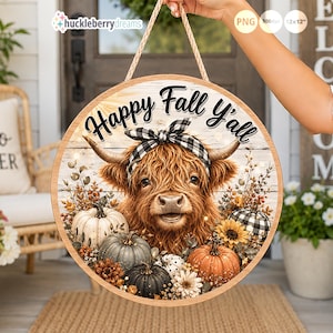May include: A round wooden sign featuring a highland cow wearing a black and white buffalo plaid bow, surrounded by pumpkins, sunflowers, and pinecones. The text "Happy Fall Y'all" is printed in black script at the top. It hangs from a rope.
