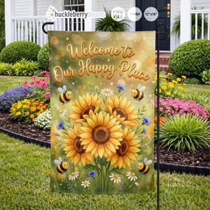 May include: A garden flag featuring a watercolor design with sunflowers, bees, and daisies. The flag reads "Welcome to Our Happy Place" in gold lettering. The flag is 12" x 18" and is displayed in a garden.