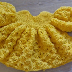 Robe de fille de bébé tricoté à la main