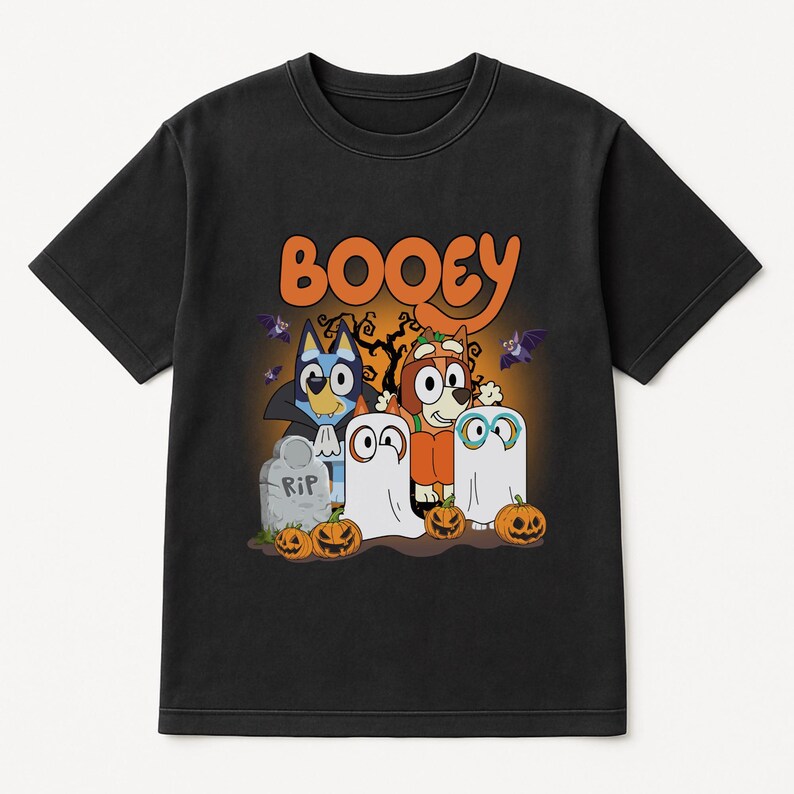 A black t-shirt with a Halloween-themed graphic design featuring characters from the children's television series Booyie.