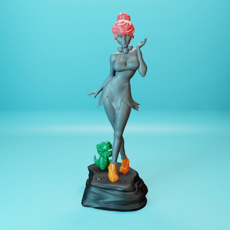 May include: A gray figurine of a woman with pink hair, wearing a gray dress and orange shoes. She is standing on a black rock base with a green dinosaur figurine beside her.